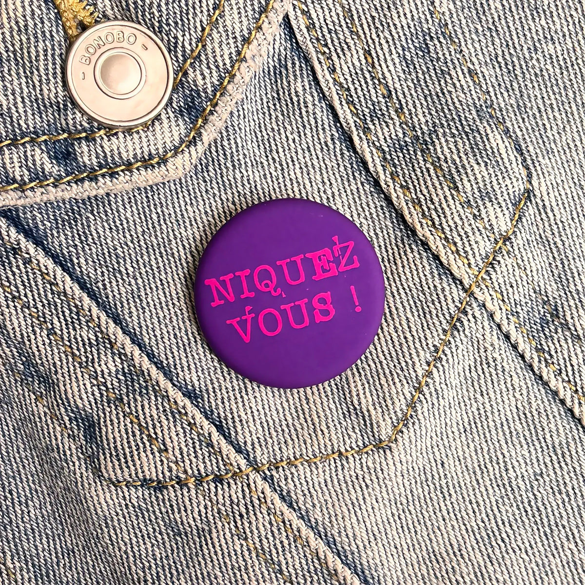 Badge « Niquez-vous »