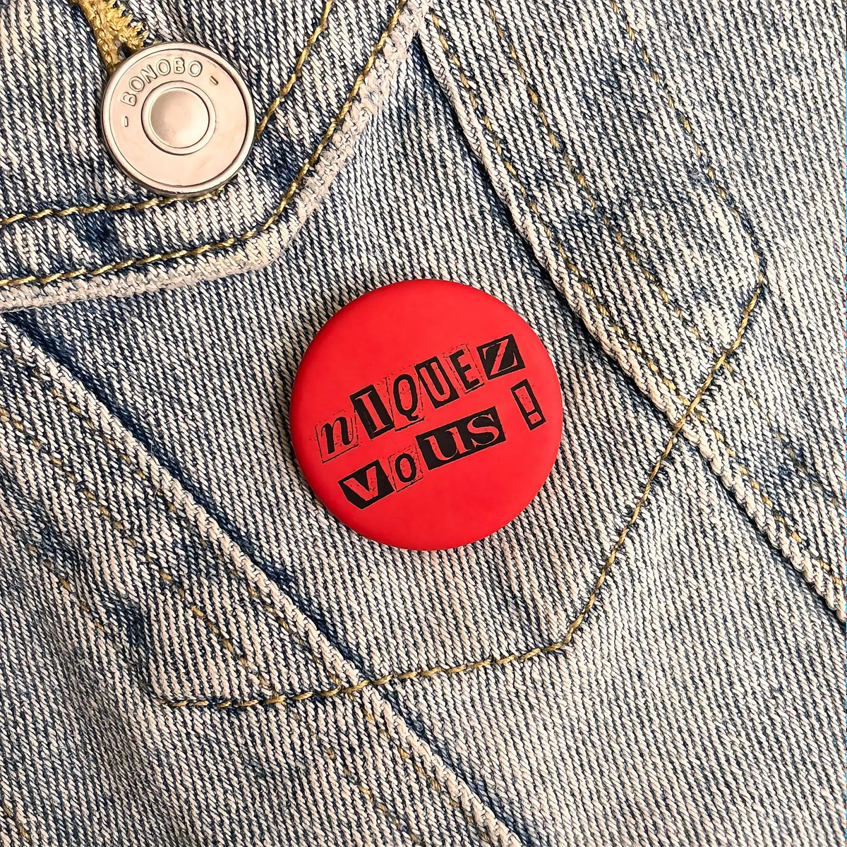 Badge « Niquez-vous »